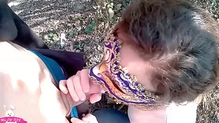 Chilling my girlfriend gives me a blowjob in the park