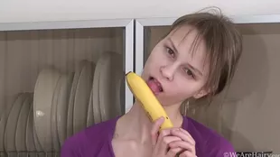 A slim European teen indulges in solo play with a vibrator, donning underwear