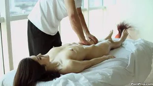 Elana Dobrev's sensual oral performance on an oiled-up body